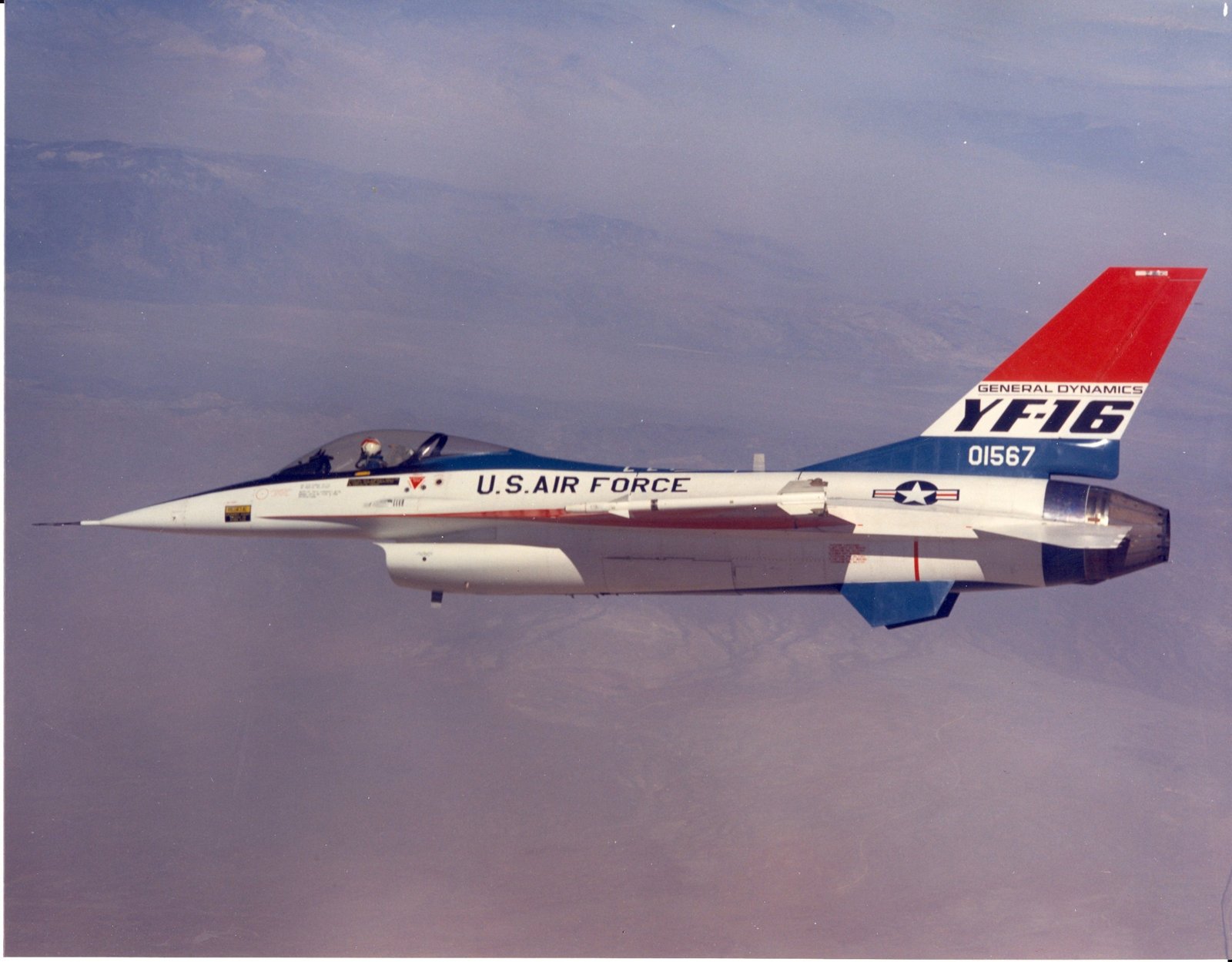 The first General Dynamics YF-16 prototype, serial 01567, in flight with a missile on the wingtip